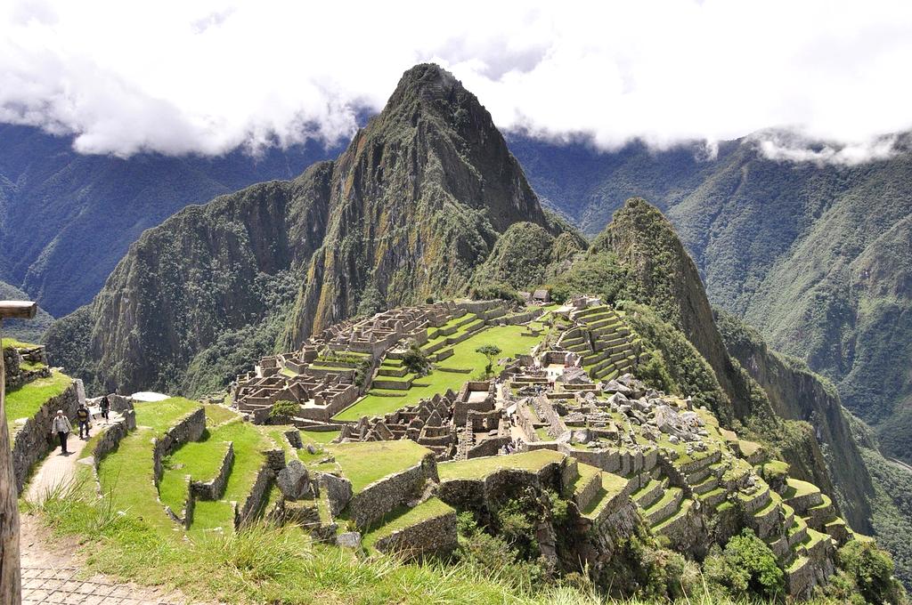 Ancient Peruvian ruins of Machu Picchu shrouded in mystical clouds