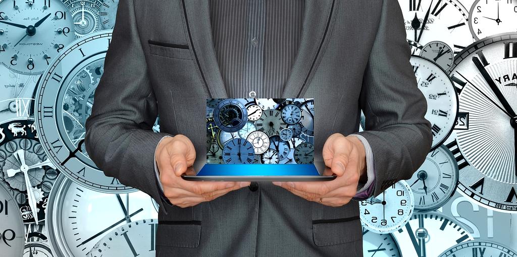 Professional travel consultant with world map and planning documents